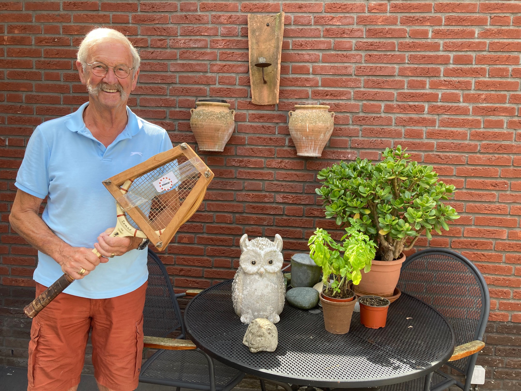 Kees met tennisracket